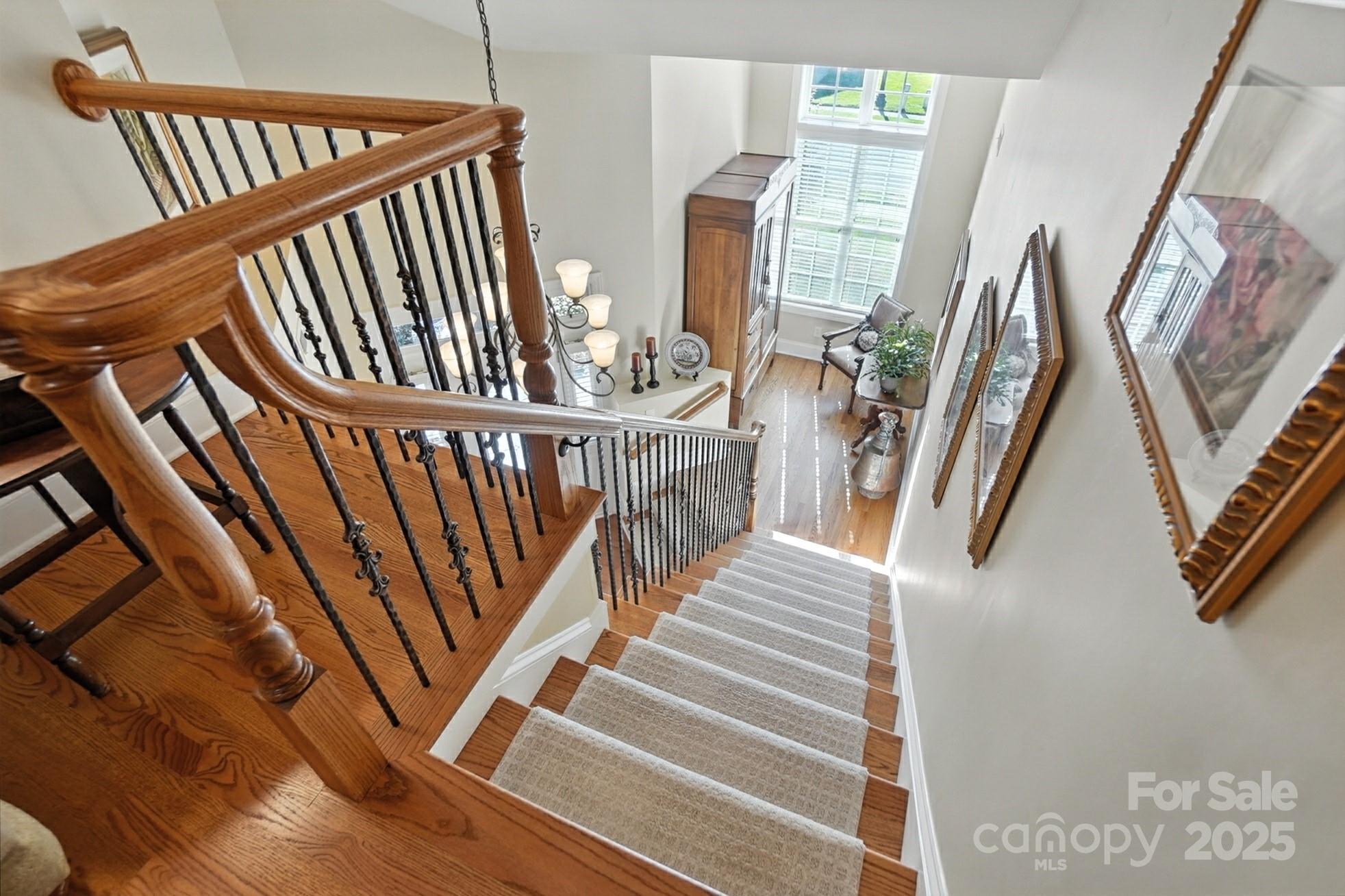 10906 Round Rock Road Charlotte, NC 28277 - Photo 28 of 45 a view of stairs with an hallway