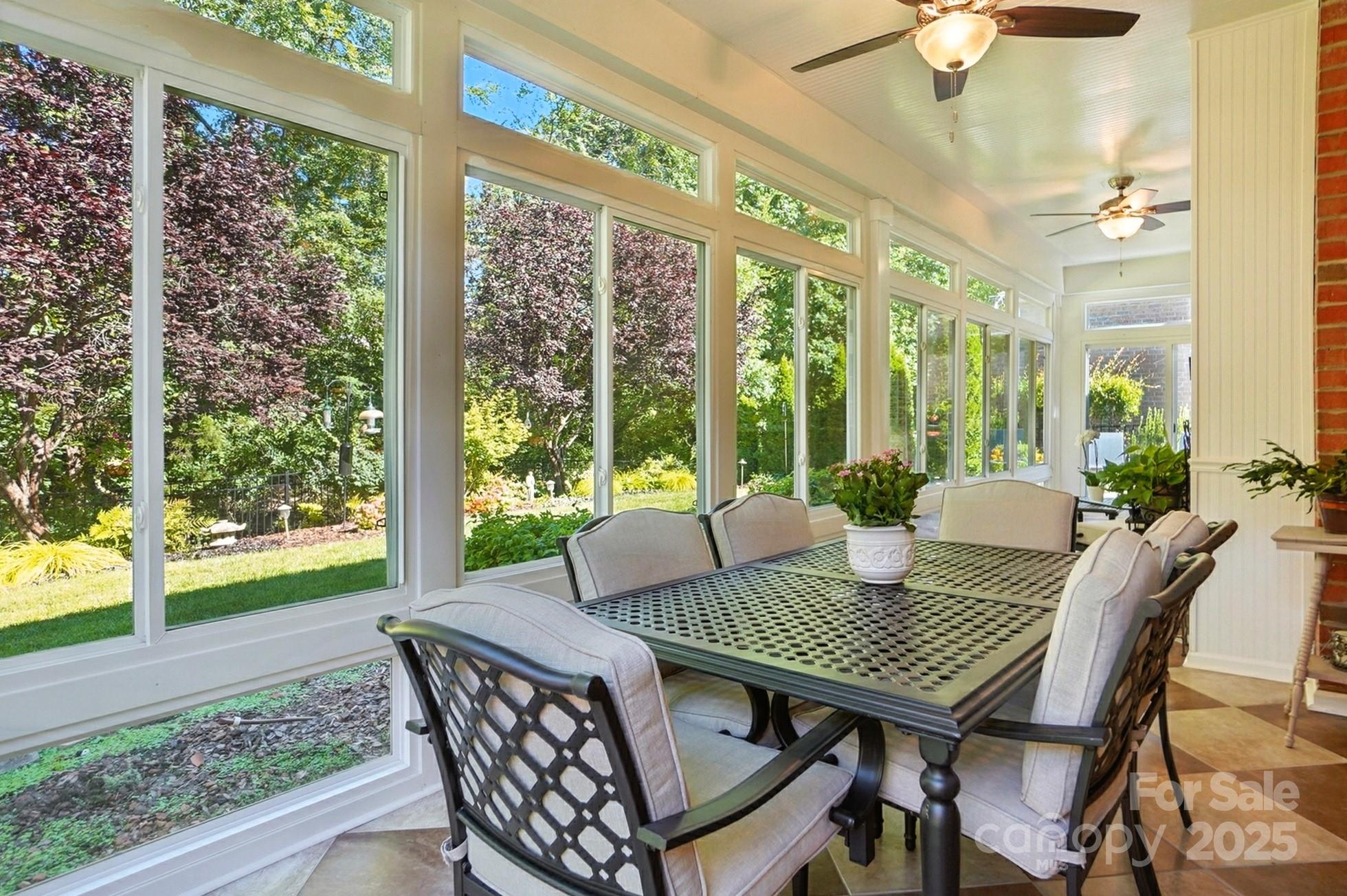 10906 Round Rock Road Charlotte, NC 28277 - Photo 37 of 45 a view of a dining room with furniture window and outside view