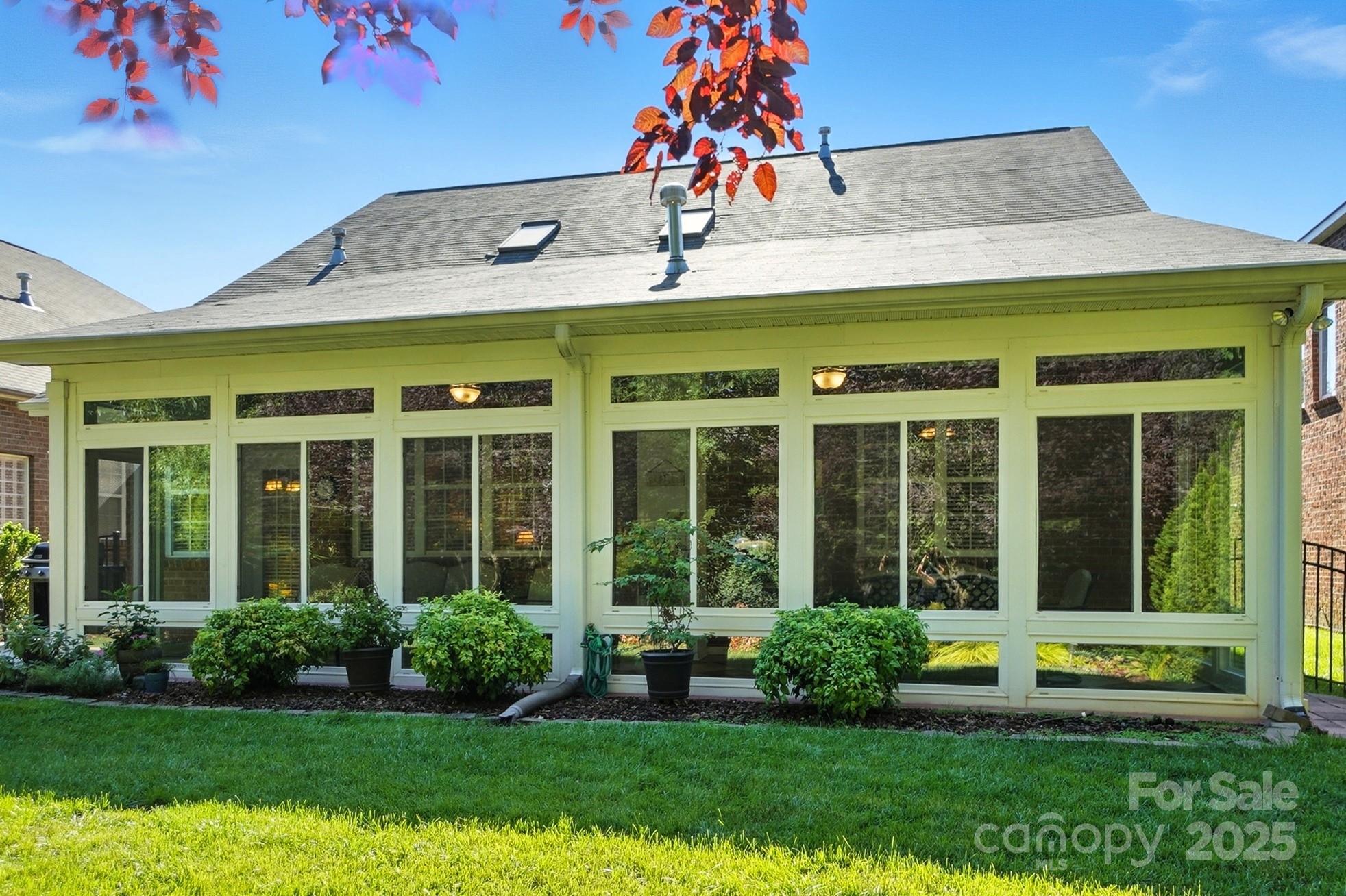 10906 Round Rock Road Charlotte, NC 28277 - Photo 38 of 45 a view of a house with a yard
