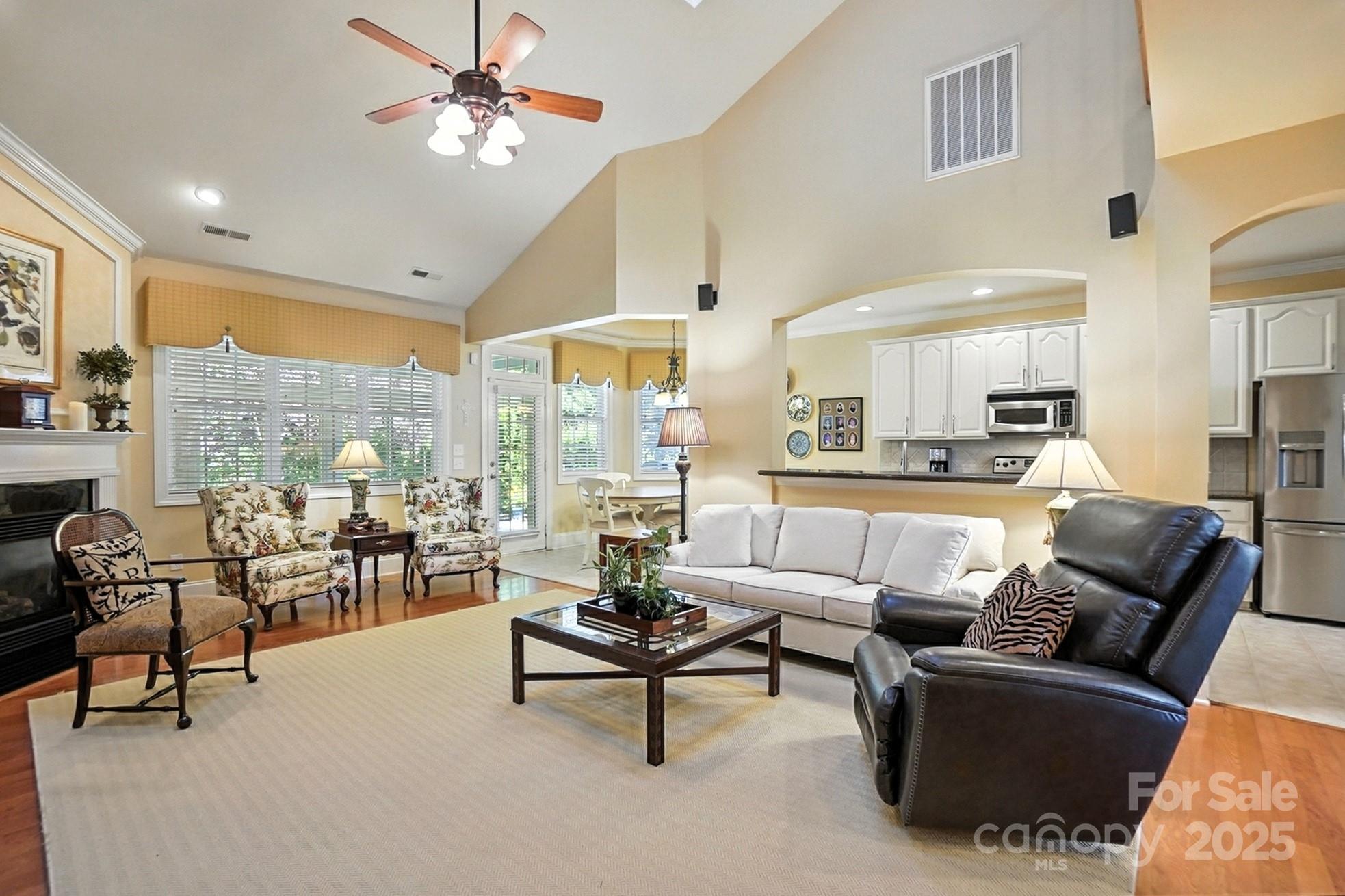 10906 Round Rock Road Charlotte, NC 28277 - Photo 10 of 45 a living room with furniture and a large window