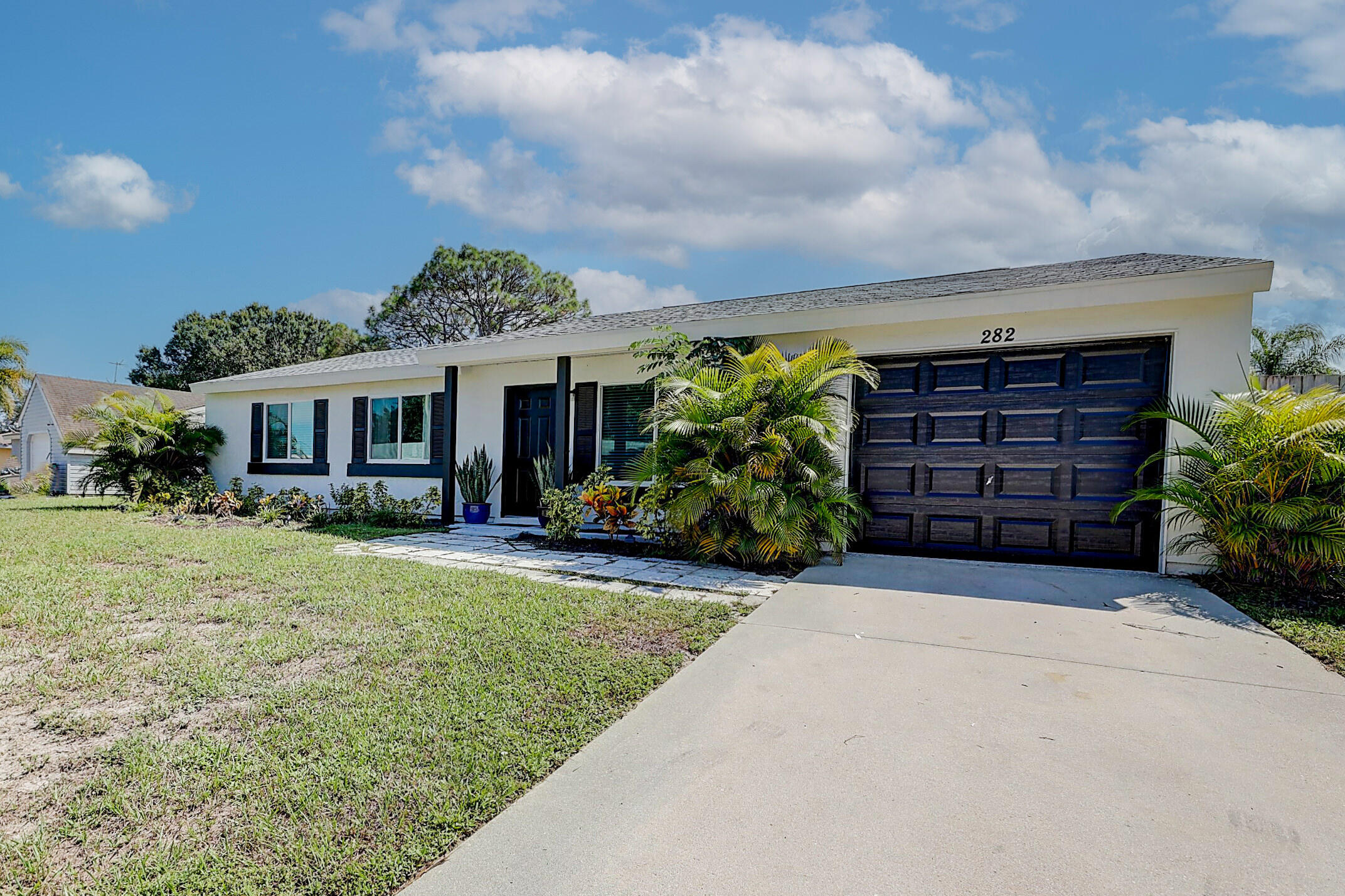 282 Southwest Homeland Road Port St. Lucie, FL 34953 - Photo 1 of 30 01_3j0a8152_3_4_5_6