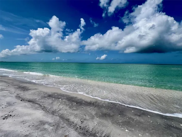 a view of a lake with a mountain in the background