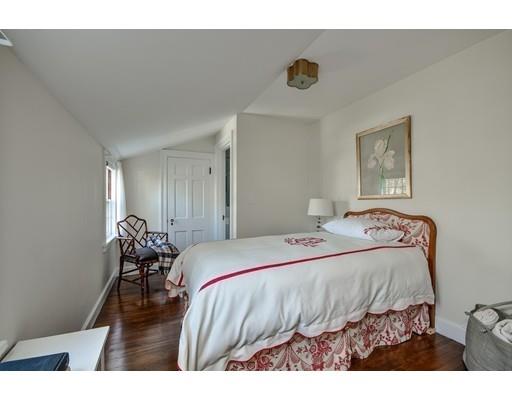 30 Whiting Road Wellesley, MA 02481 - Photo 19 of 24 a bedroom with a bed and a table