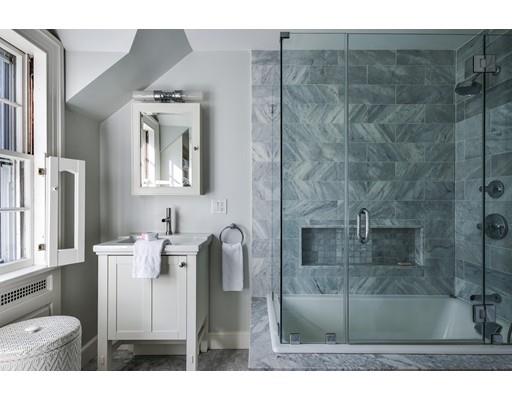 30 Whiting Road Wellesley, MA 02481 - Photo 20 of 24 a bathroom with a granite countertop sink a mirror and shower