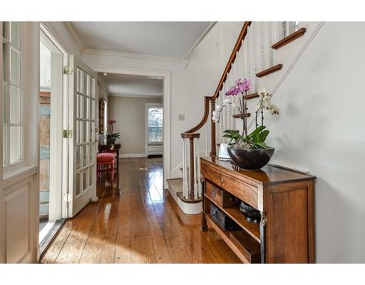 30 Whiting Road Wellesley, MA 02481 - Photo 4 of 24 a hallway with wooden floor and furniture