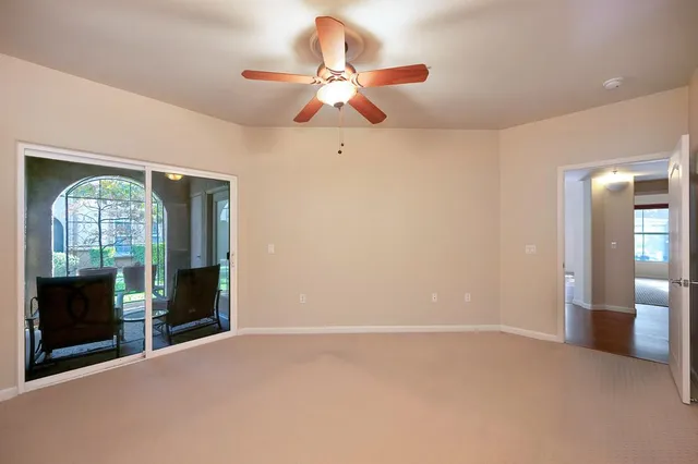 a bathroom with a double vanity sink a mirror and a bathtub