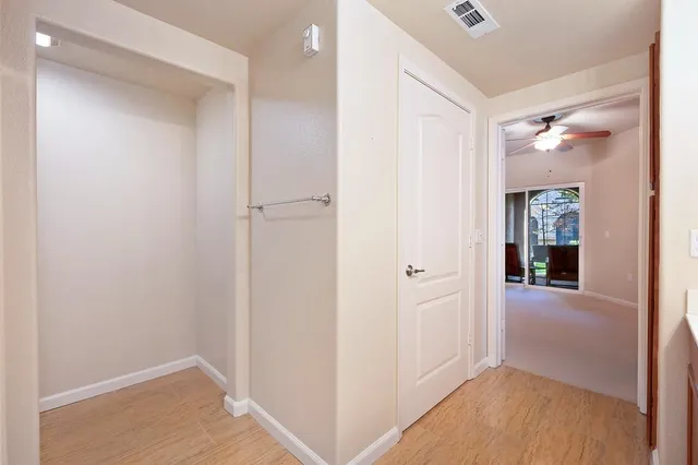 a bathroom with a sink a toilet a shower and a mirror