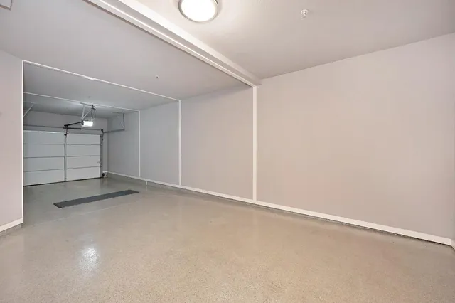 a view of a patio with swimming pool table and chairs