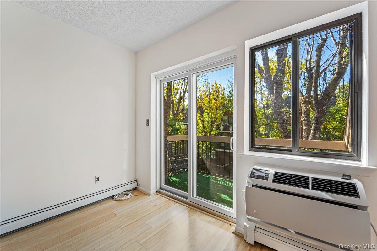 71-29 Sutton Place, Unit 3 Queens, NY 11365 - Photo 11 of 24 a view of a large window with an outdoor view