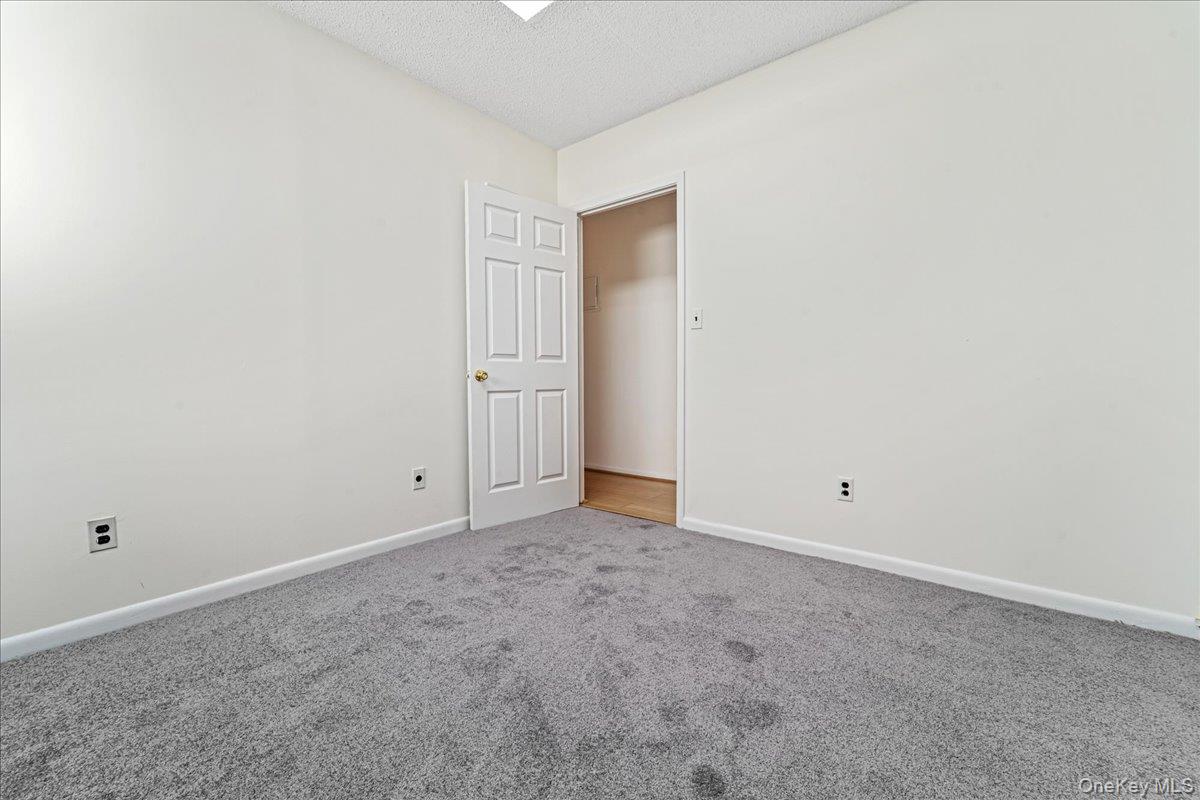 71-29 Sutton Place, Unit 3 Queens, NY 11365 - Photo 14 of 24 a view of an empty room