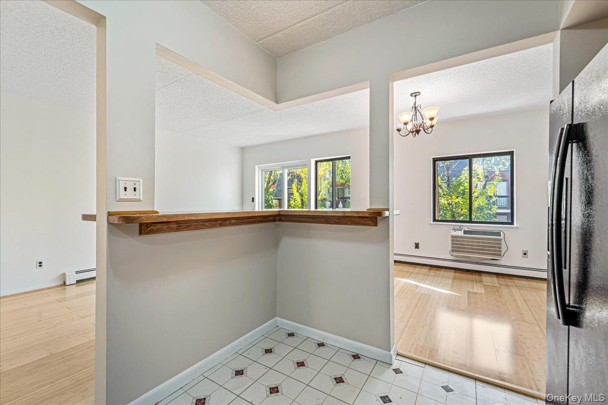 71-29 Sutton Place, Unit 3 Queens, NY 11365 - Photo 9 of 24 a view of a kitchen with a window