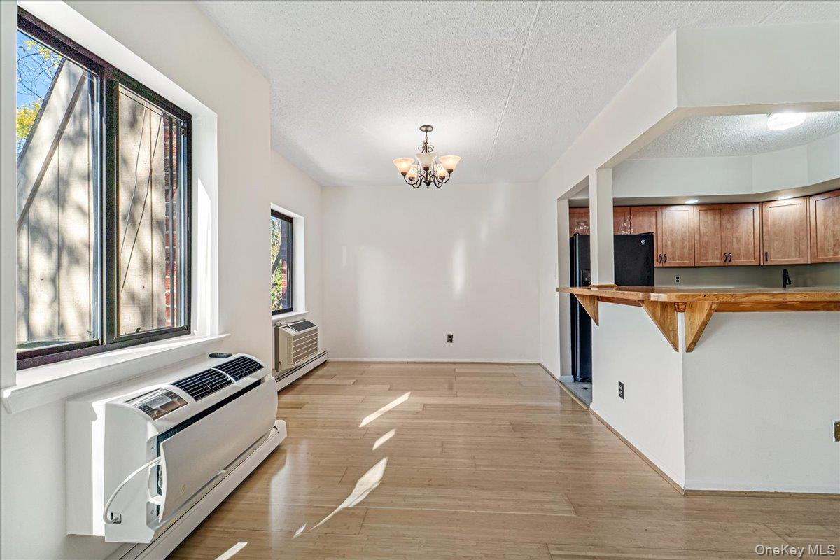 71-29 Sutton Place, Unit 3 Queens, NY 11365 - Photo 10 of 24 a view of a kitchen with a sink and a stove top oven