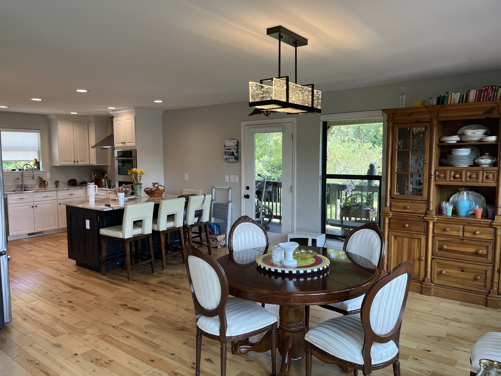 950 Sauger Road Charlotte, TN 37036 - Photo 15 of 46 a view of a dining room with furniture window and wooden floor