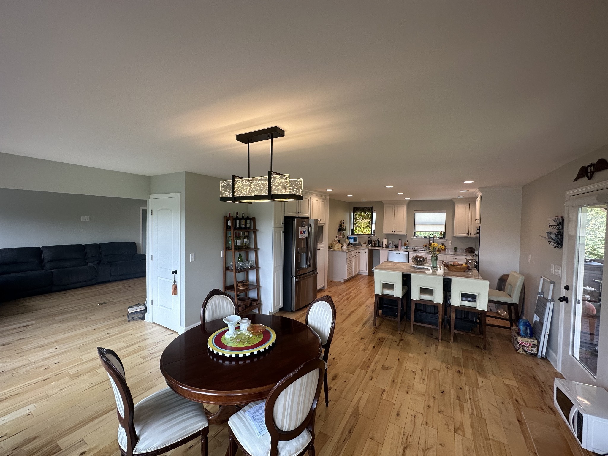 950 Sauger Road Charlotte, TN 37036 - Photo 16 of 46 a view of a dining room with furniture and wooden floor