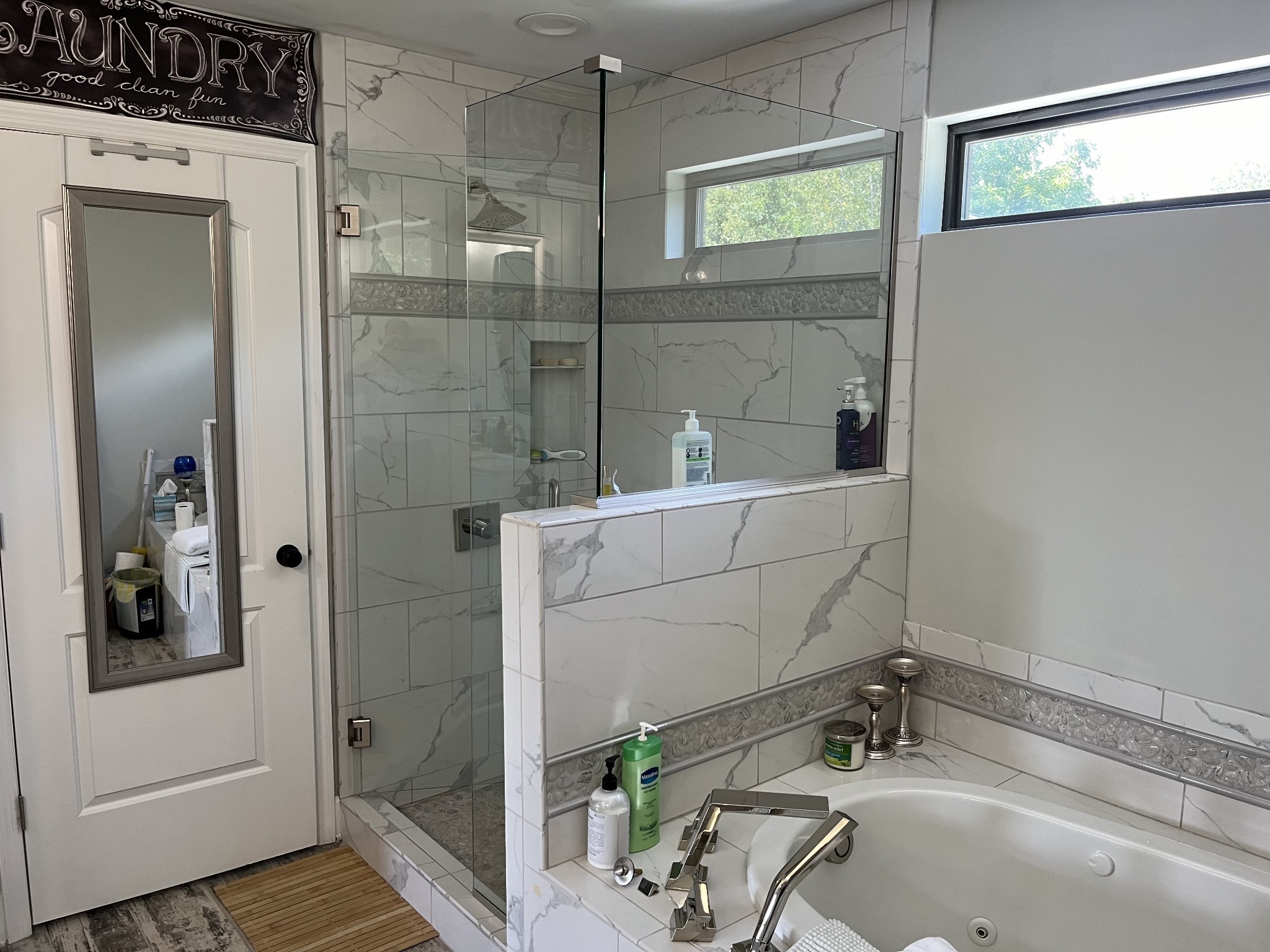 950 Sauger Road Charlotte, TN 37036 - Photo 21 of 46 a bathroom with a sink and a shower