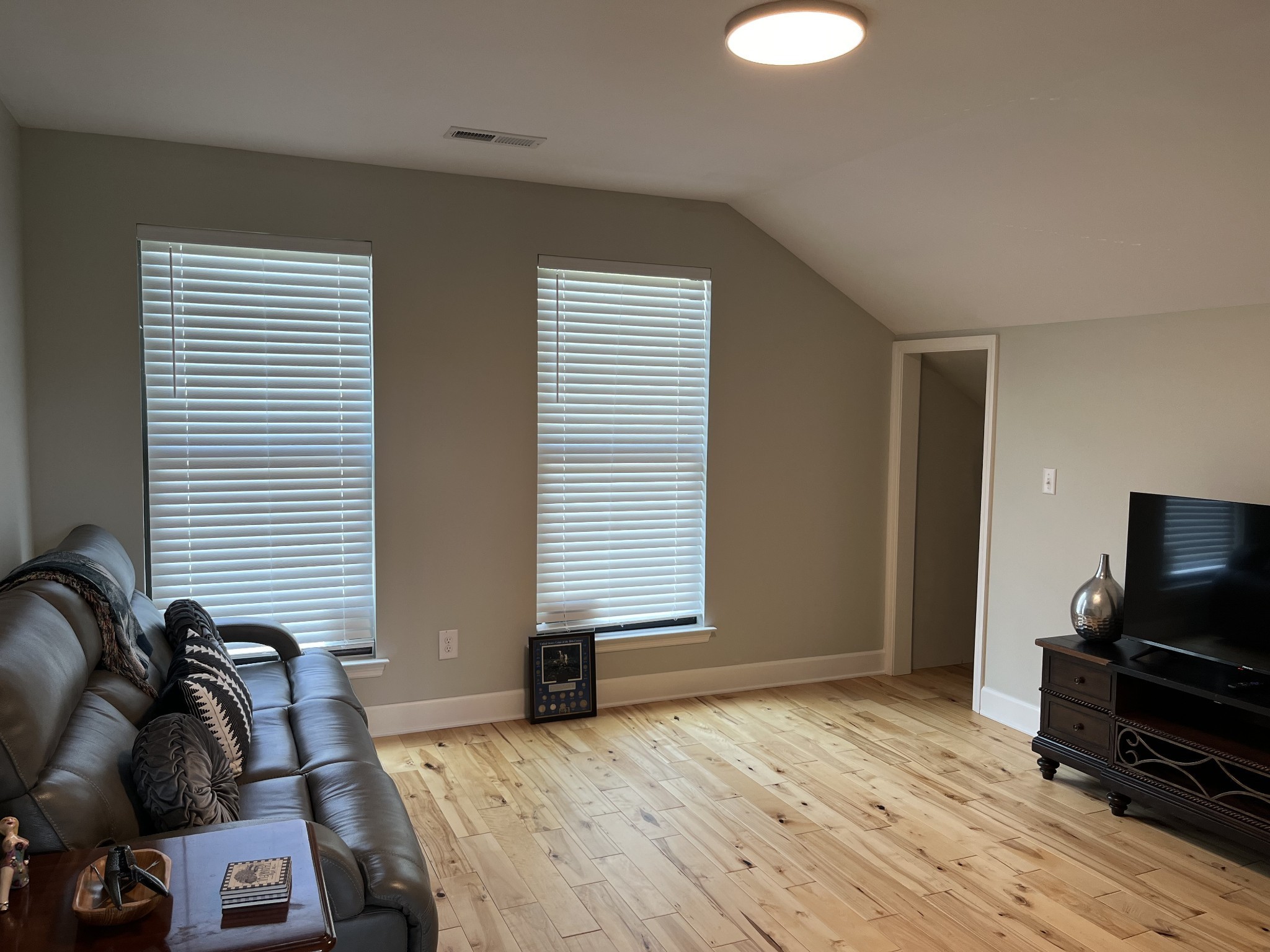 950 Sauger Road Charlotte, TN 37036 - Photo 27 of 46 a bedroom with furniture and a flat screen tv