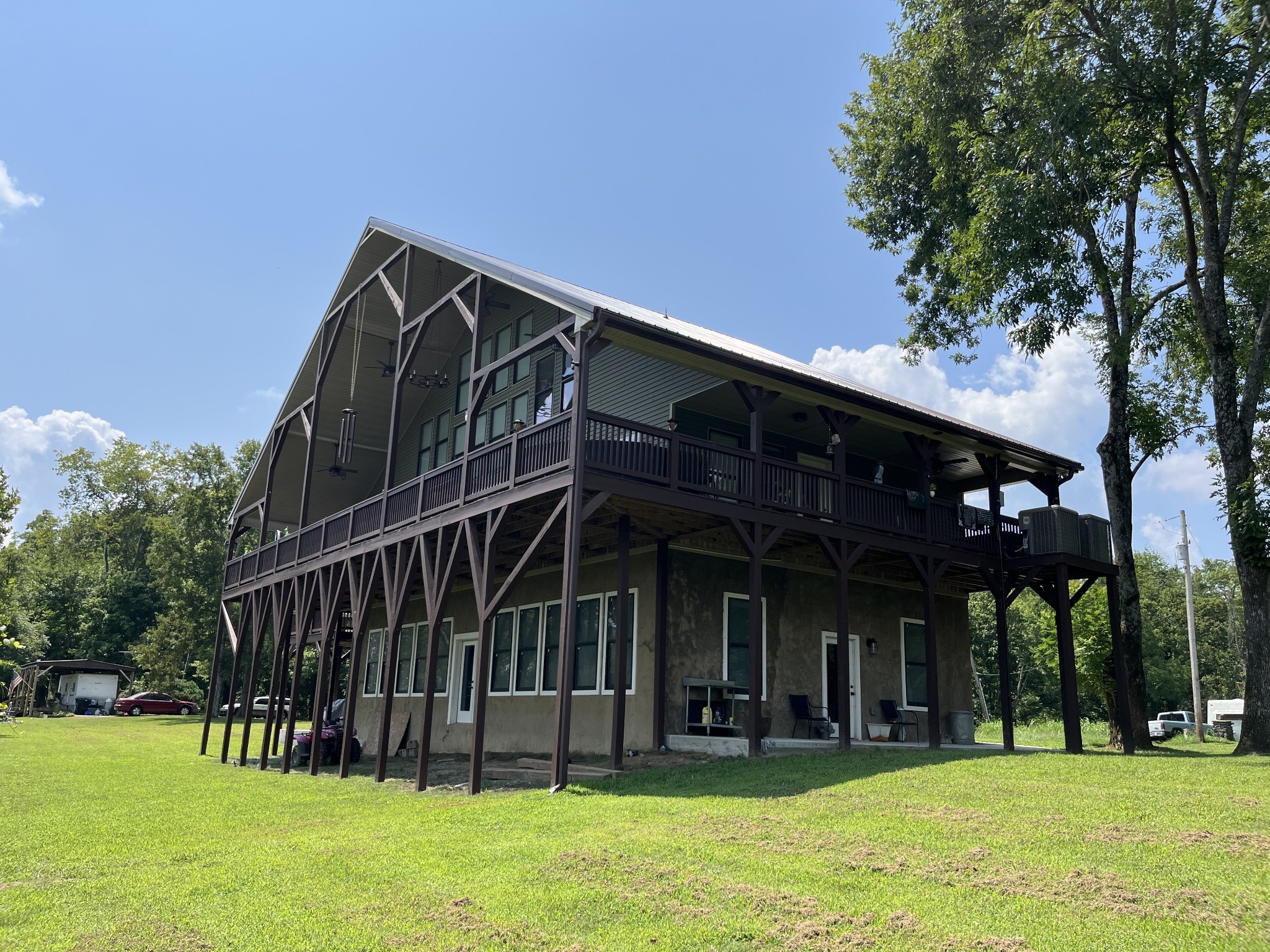 950 Sauger Road Charlotte, TN 37036 - Photo 3 of 46 a view of a house with a yard