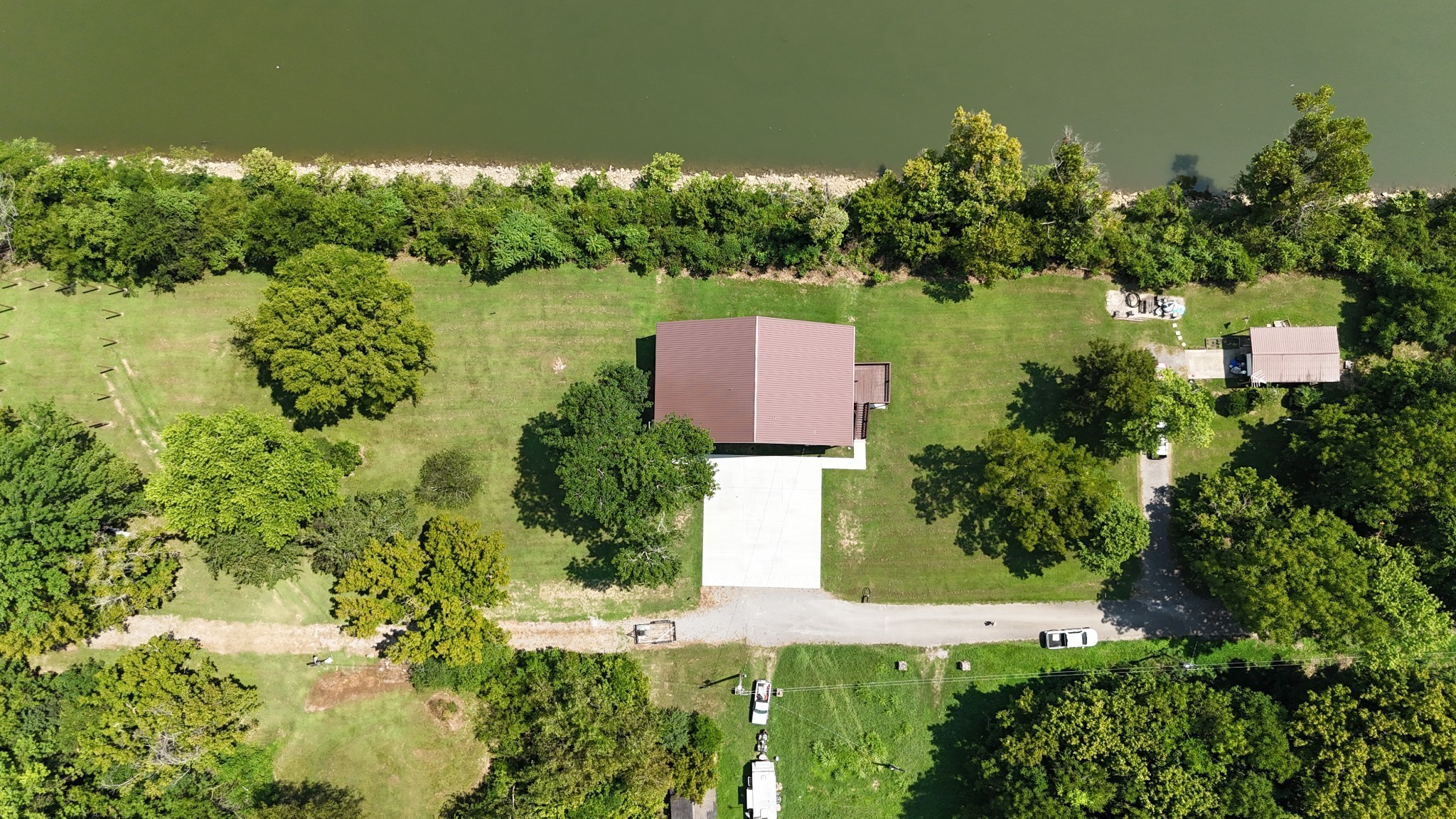 950 Sauger Road Charlotte, TN 37036 - Photo 46 of 46 an aerial view of a house with a yard