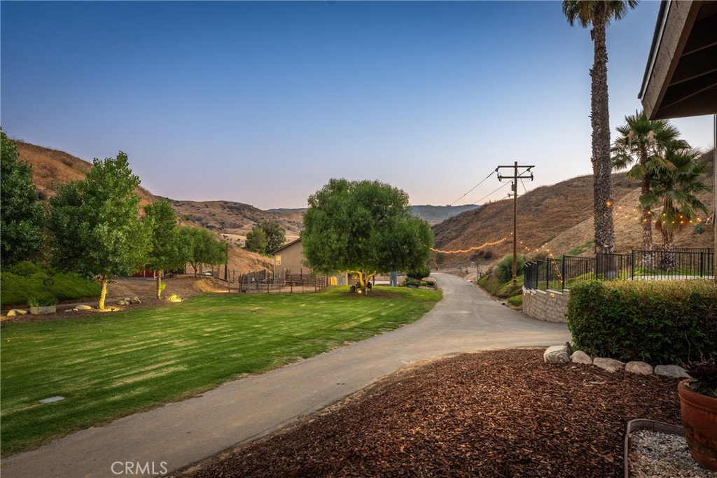 30300 Live Oak Canyon Road Redlands, CA 92373 - Photo 9 of 67 a view of a road with a building in the background