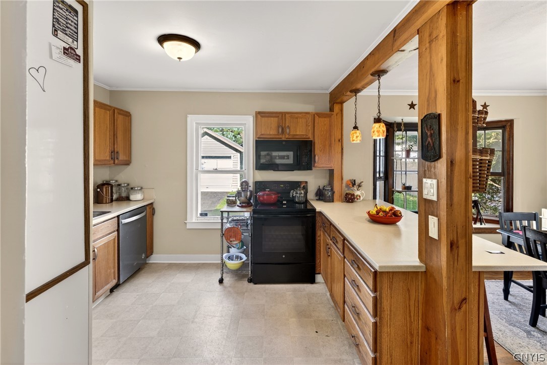 305 Newcastle Road Geddes, NY 13219 - Photo 6 of 29 Kitchen open to the Dining Room