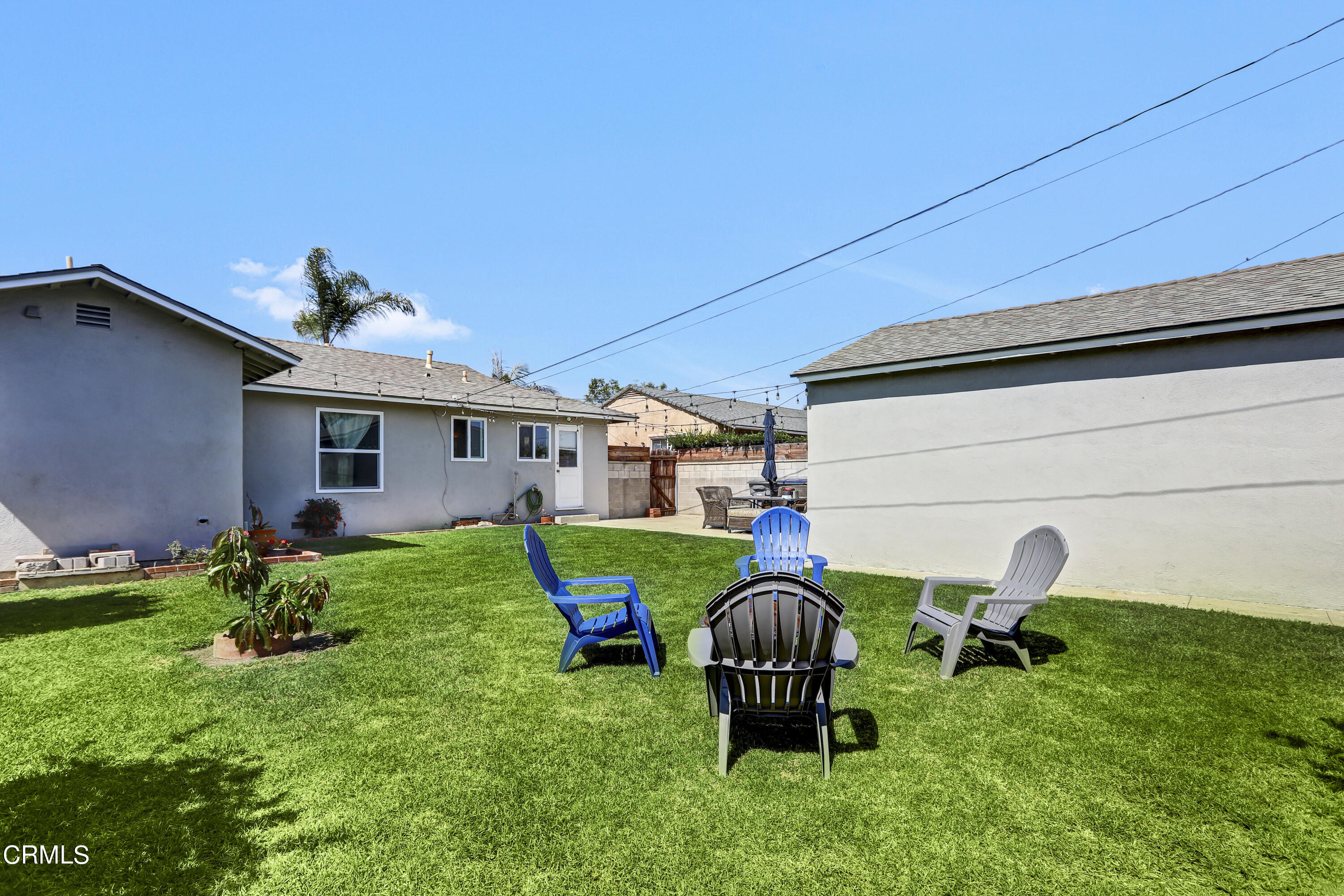 930 Doris Avenue Oxnard, CA 93030 - Photo 15 of 16 a house view with a sitting space and garden
