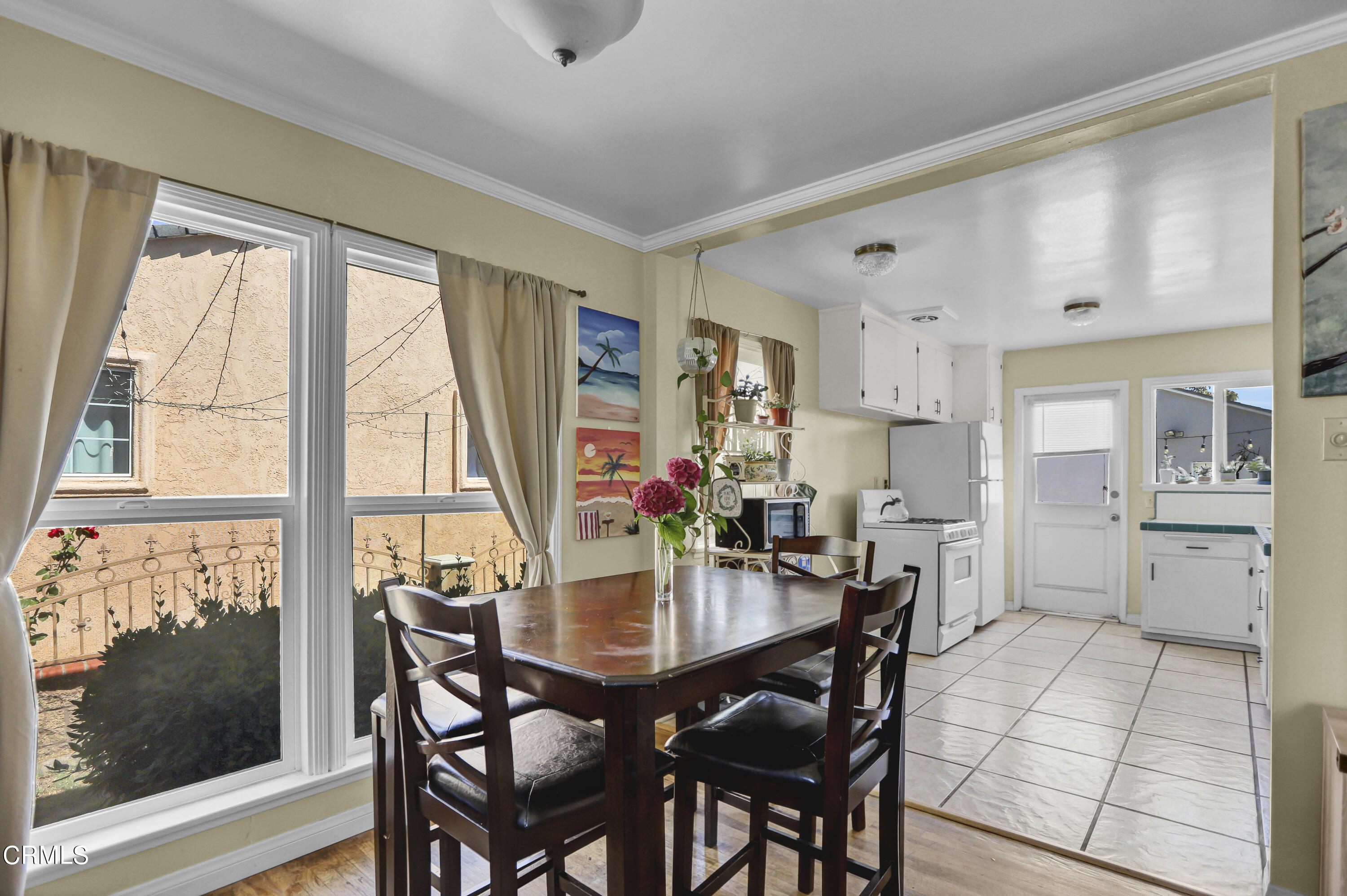 930 Doris Avenue Oxnard, CA 93030 - Photo 6 of 16 a view of a dining room with furniture and window