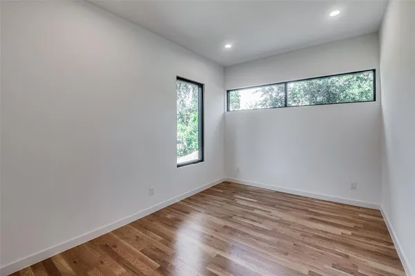 a kitchen with kitchen island a counter top space appliances and cabinets