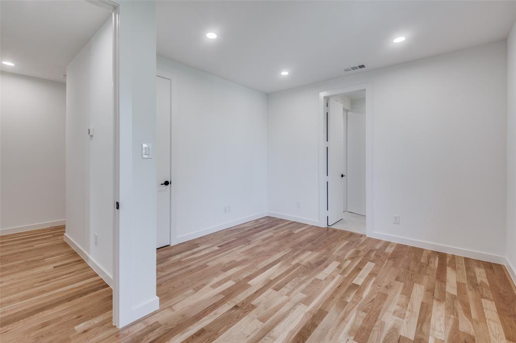 4525 Weldon Street Dallas, TX 75204 - Photo 19 of 40 a view of hallway with wooden floor