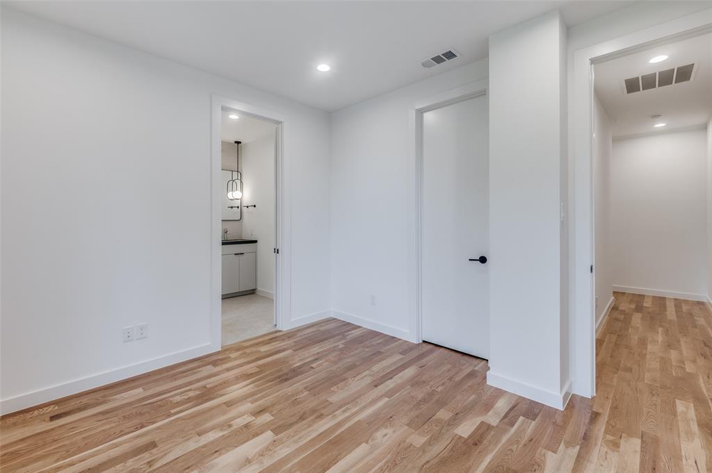 4525 Weldon Street Dallas, TX 75204 - Photo 23 of 40 a view of empty room with wooden floor
