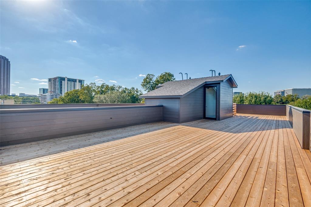 4525 Weldon Street Dallas, TX 75204 - Photo 29 of 40 a view of backyard and outdoor kitchen