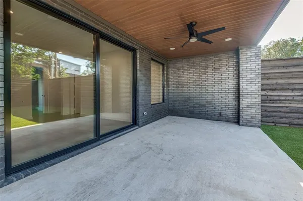 a view of backyard and outdoor kitchen