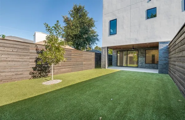 a view of outdoor space with wooden floor and seating space