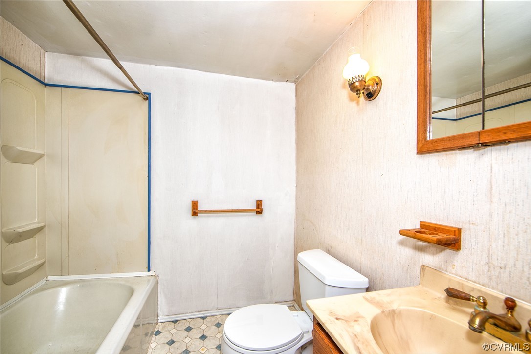 4586 Broad St Road Gum Spring, VA 23065 - Photo 12 of 23 a bathroom with a sink and toilet