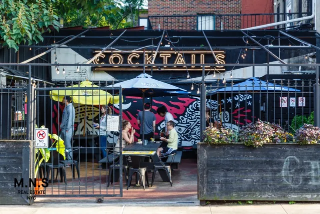 a view of a chairs and tables in the patio