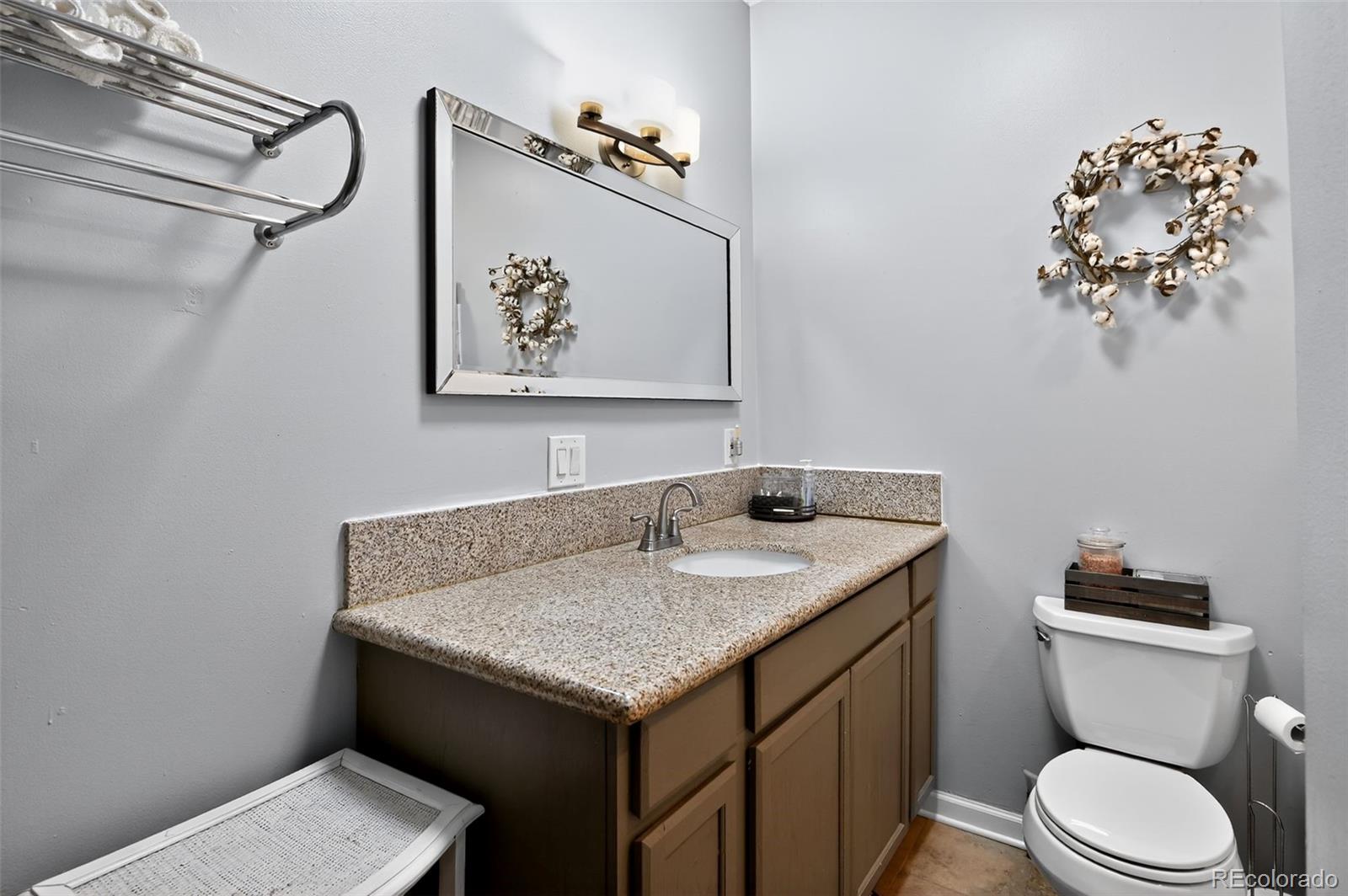 1608 Miner Street, Unit 2 Idaho Springs, CO 80452 - Photo 28 of 35 a bathroom with a sink and a toilet
