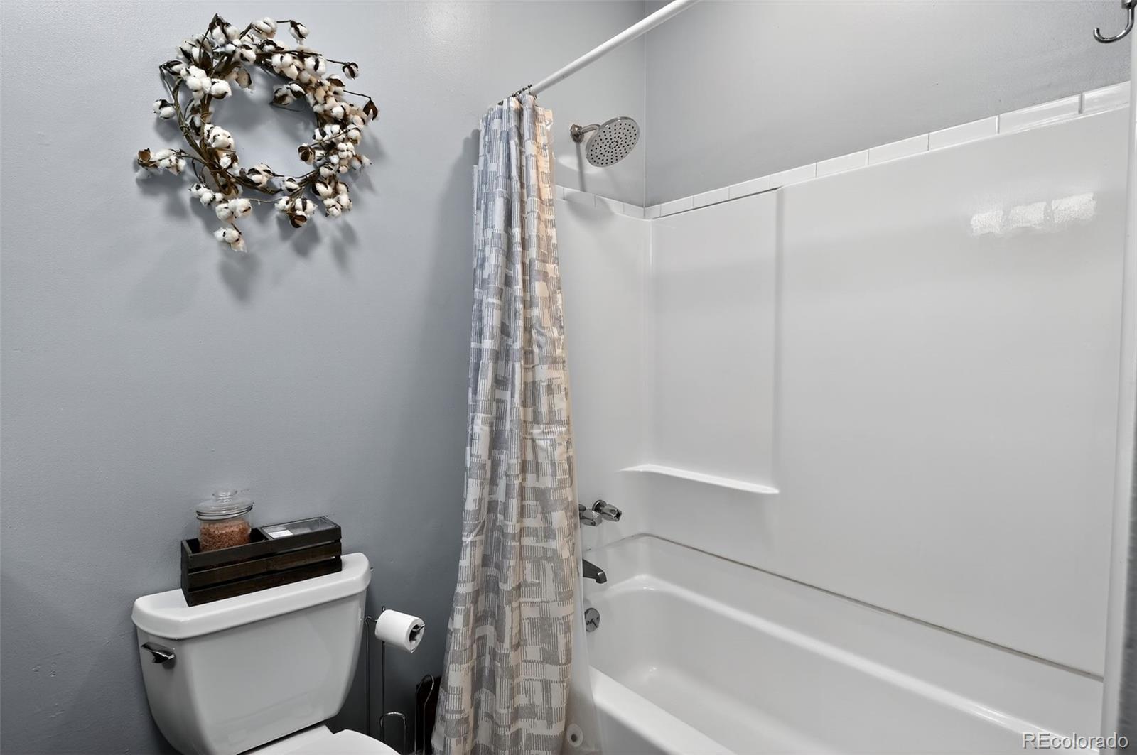 1608 Miner Street, Unit 2 Idaho Springs, CO 80452 - Photo 29 of 35 a bathroom with a bathtub and shower