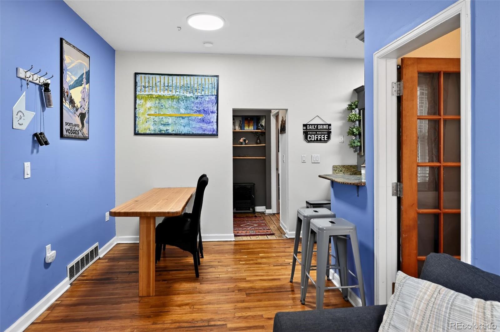 1608 Miner Street, Unit 2 Idaho Springs, CO 80452 - Photo 30 of 35 a workspace with furniture and wooden floor