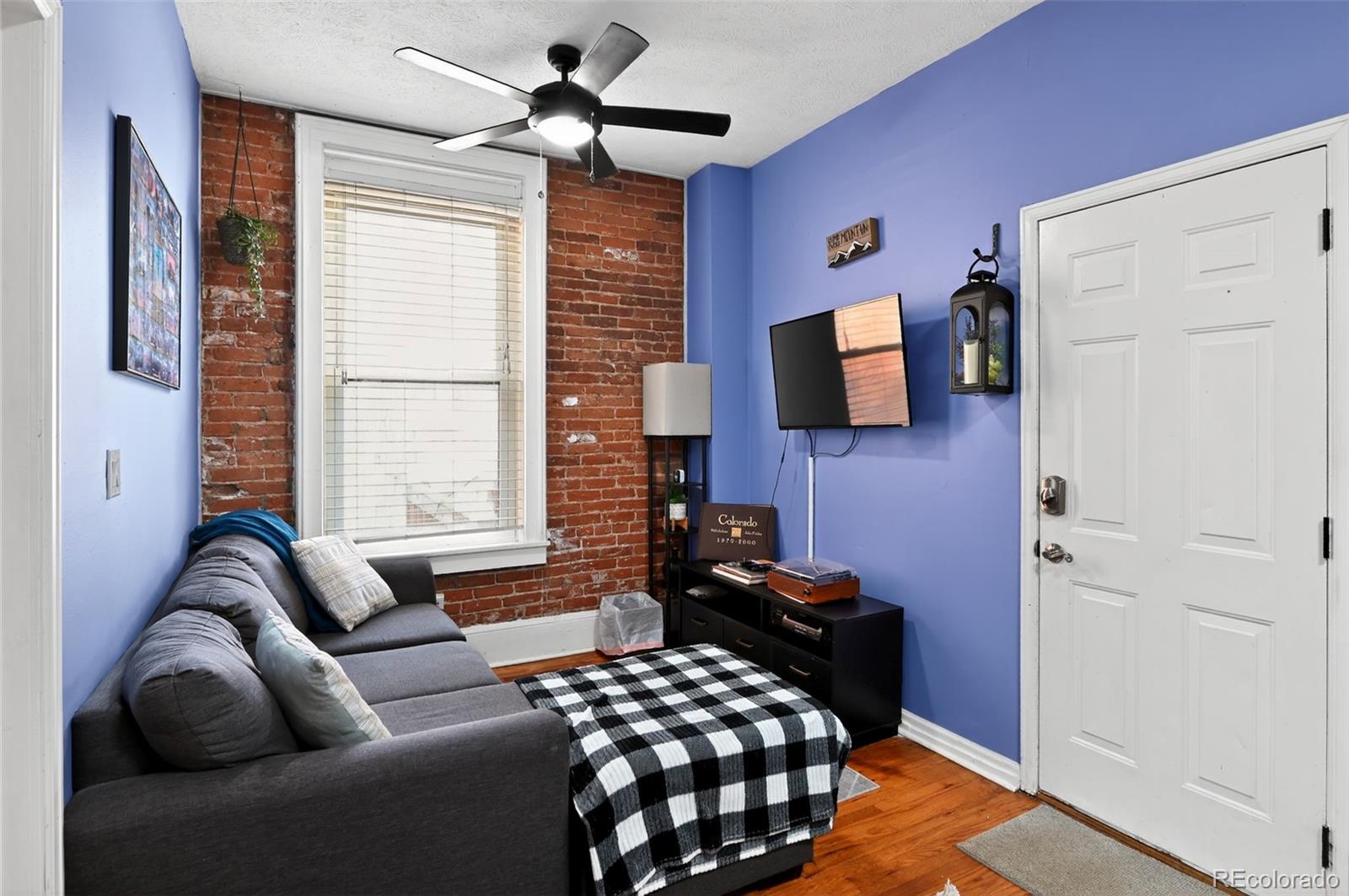 1608 Miner Street, Unit 2 Idaho Springs, CO 80452 - Photo 5 of 35 a living room with furniture