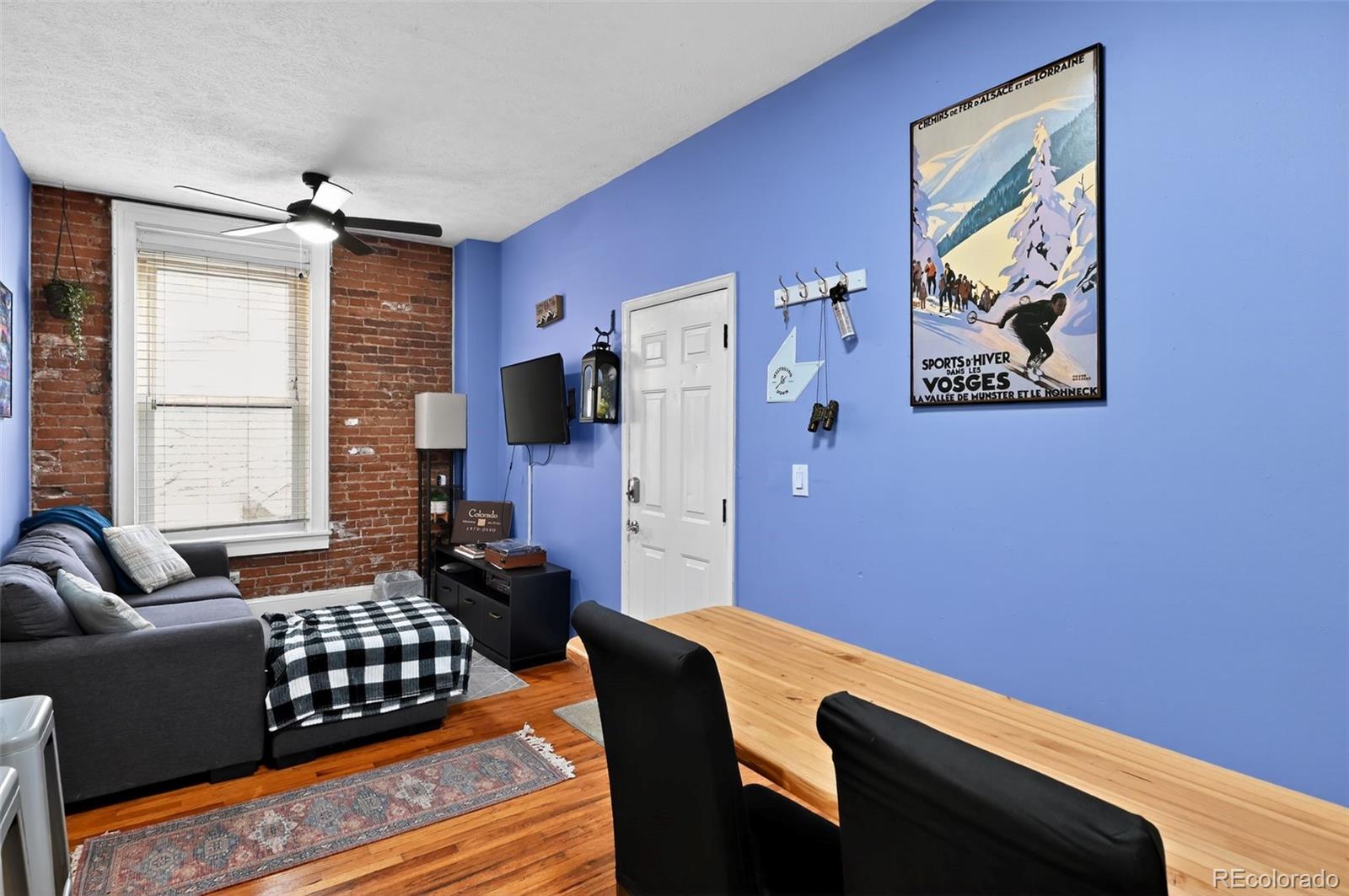 1608 Miner Street, Unit 2 Idaho Springs, CO 80452 - Photo 6 of 35 a living room with furniture and a window