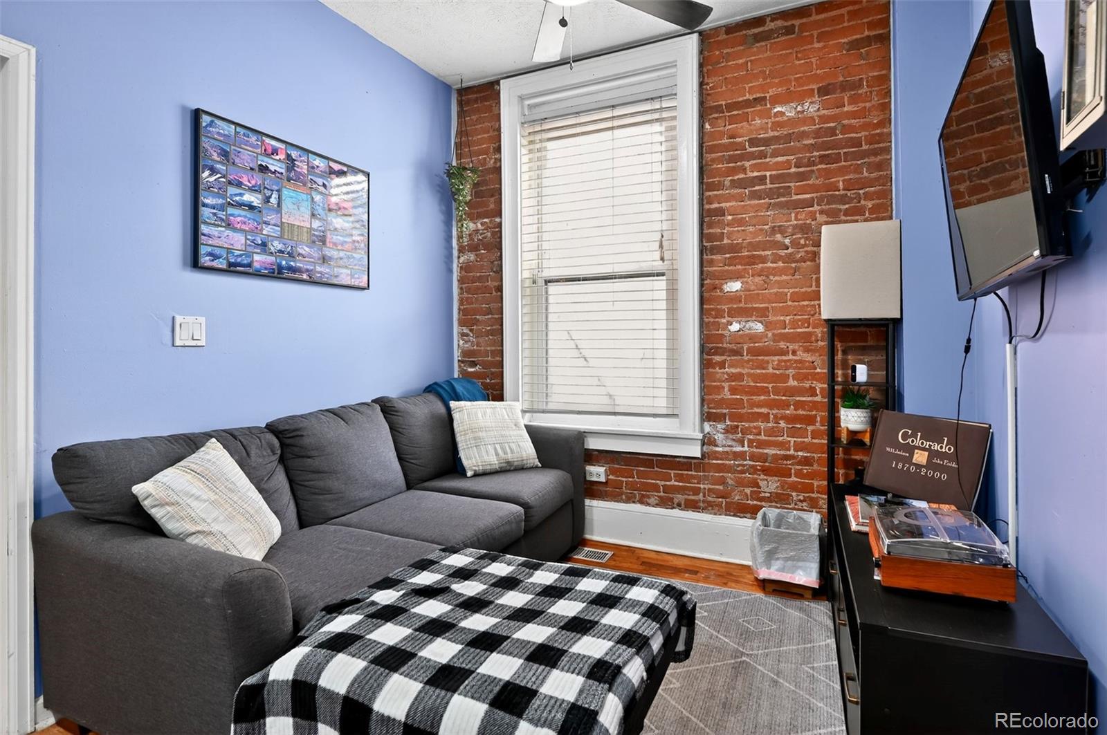 1608 Miner Street, Unit 2 Idaho Springs, CO 80452 - Photo 7 of 35 a living room with furniture and a window