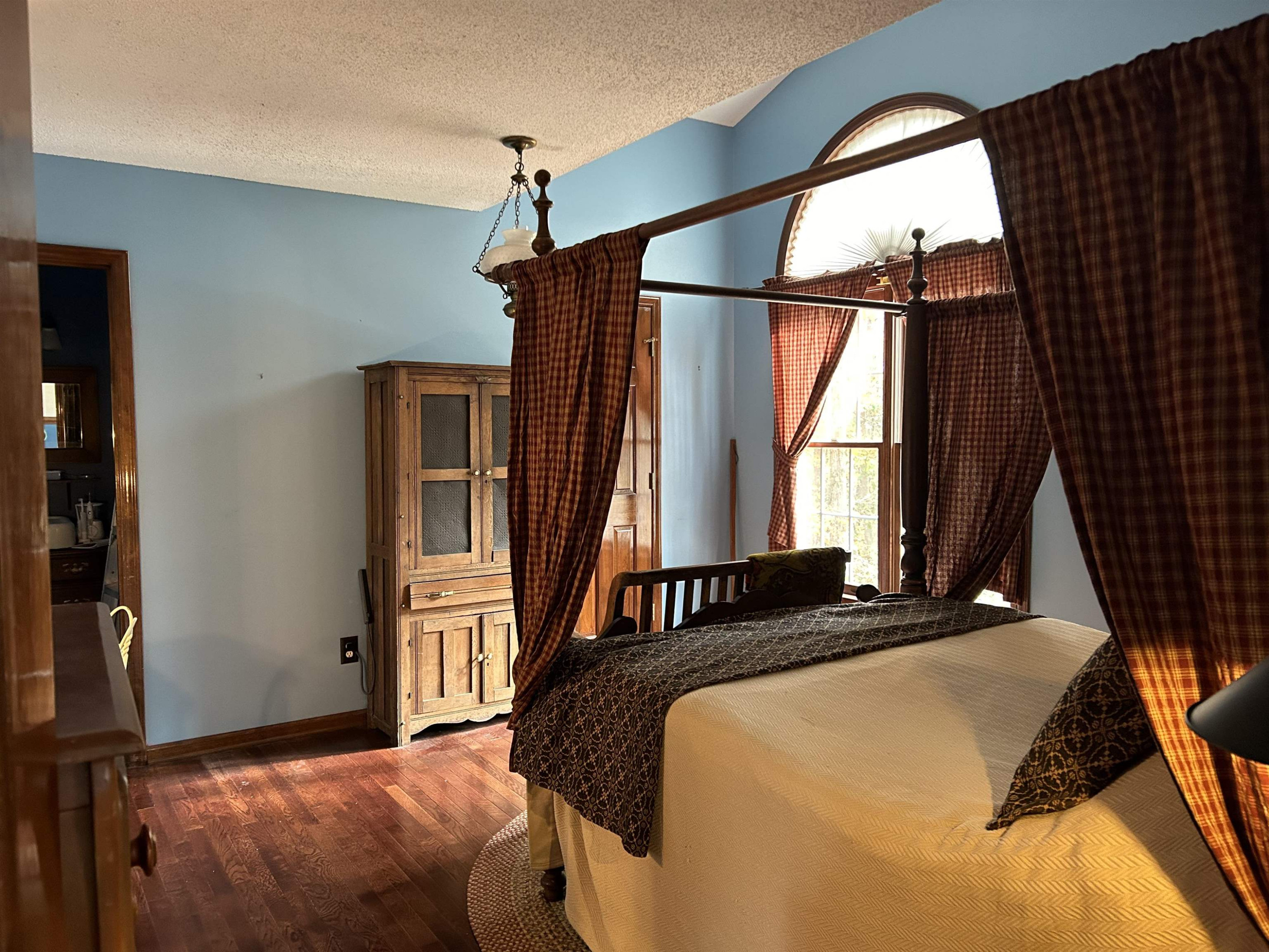 91 Violet Lane Coats, NC 27521 - Photo 12 of 19 a bedroom with a bed and a window