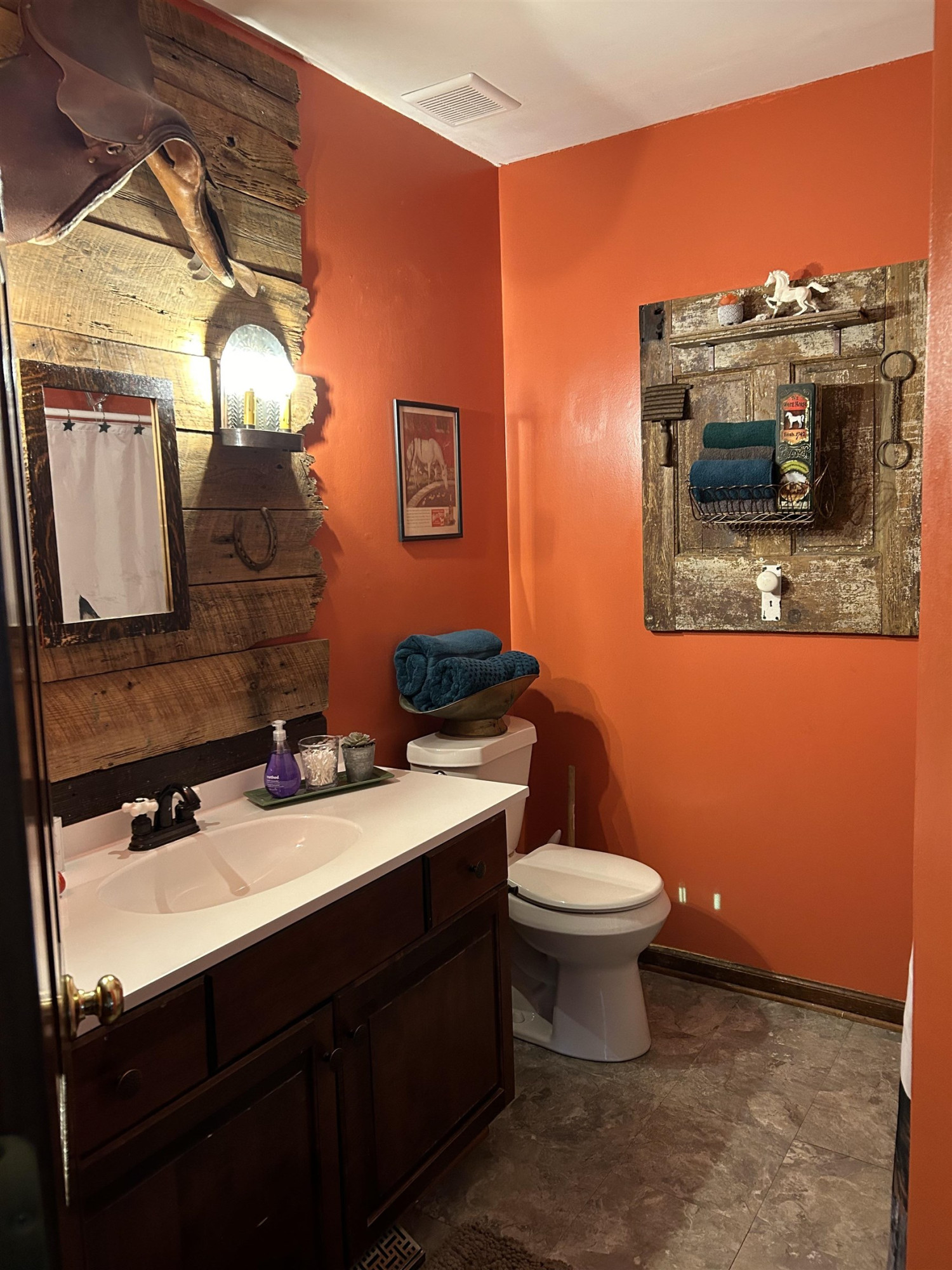 91 Violet Lane Coats, NC 27521 - Photo 18 of 19 a bathroom with a sink a toilet and mirror