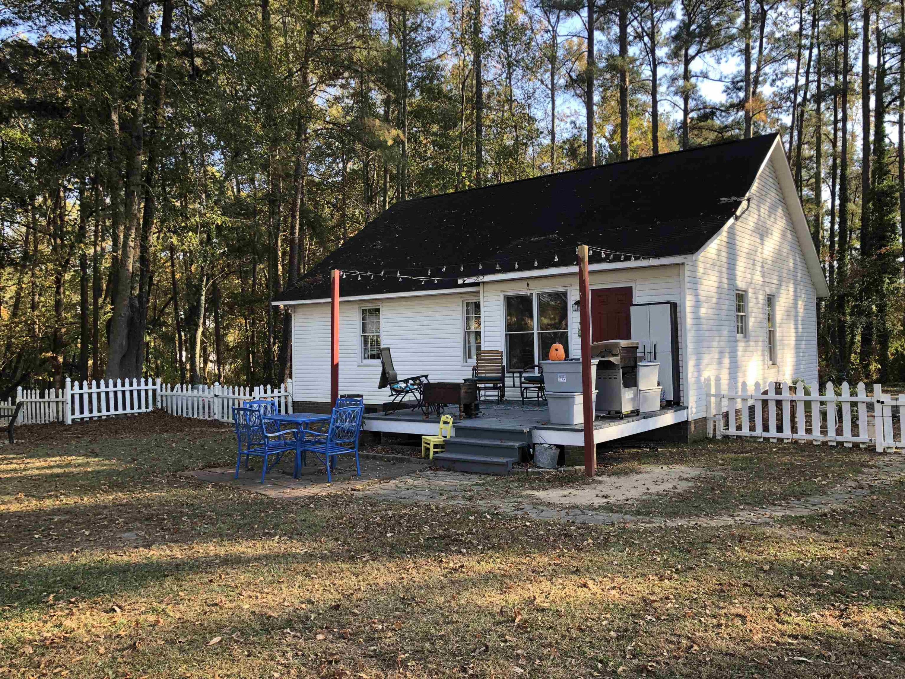 91 Violet Lane Coats, NC 27521 - Photo 2 of 19 a view of a house with backyard and sitting area