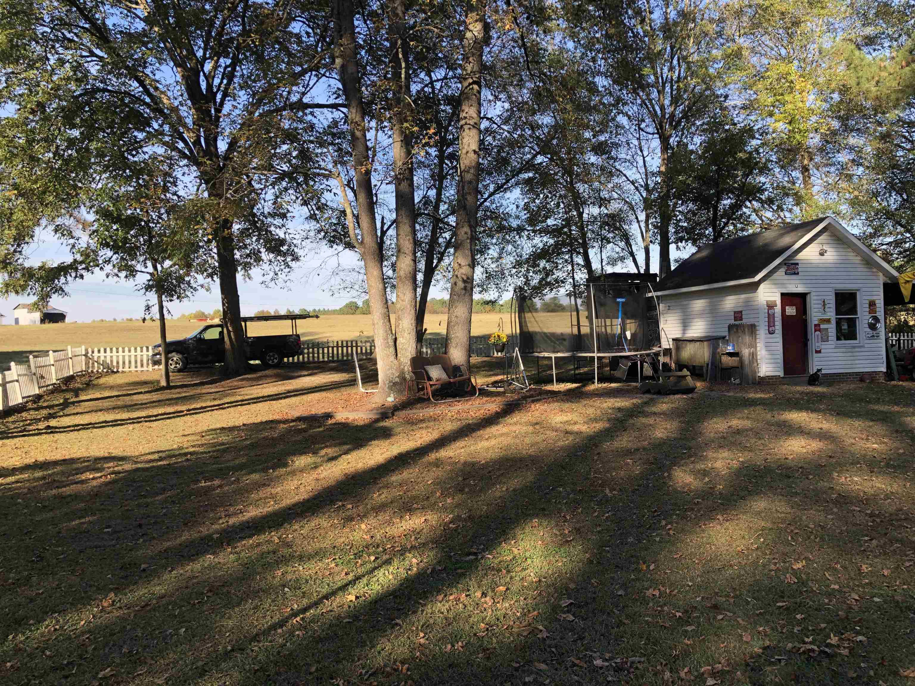 91 Violet Lane Coats, NC 27521 - Photo 3 of 19 a view of city street with tall trees