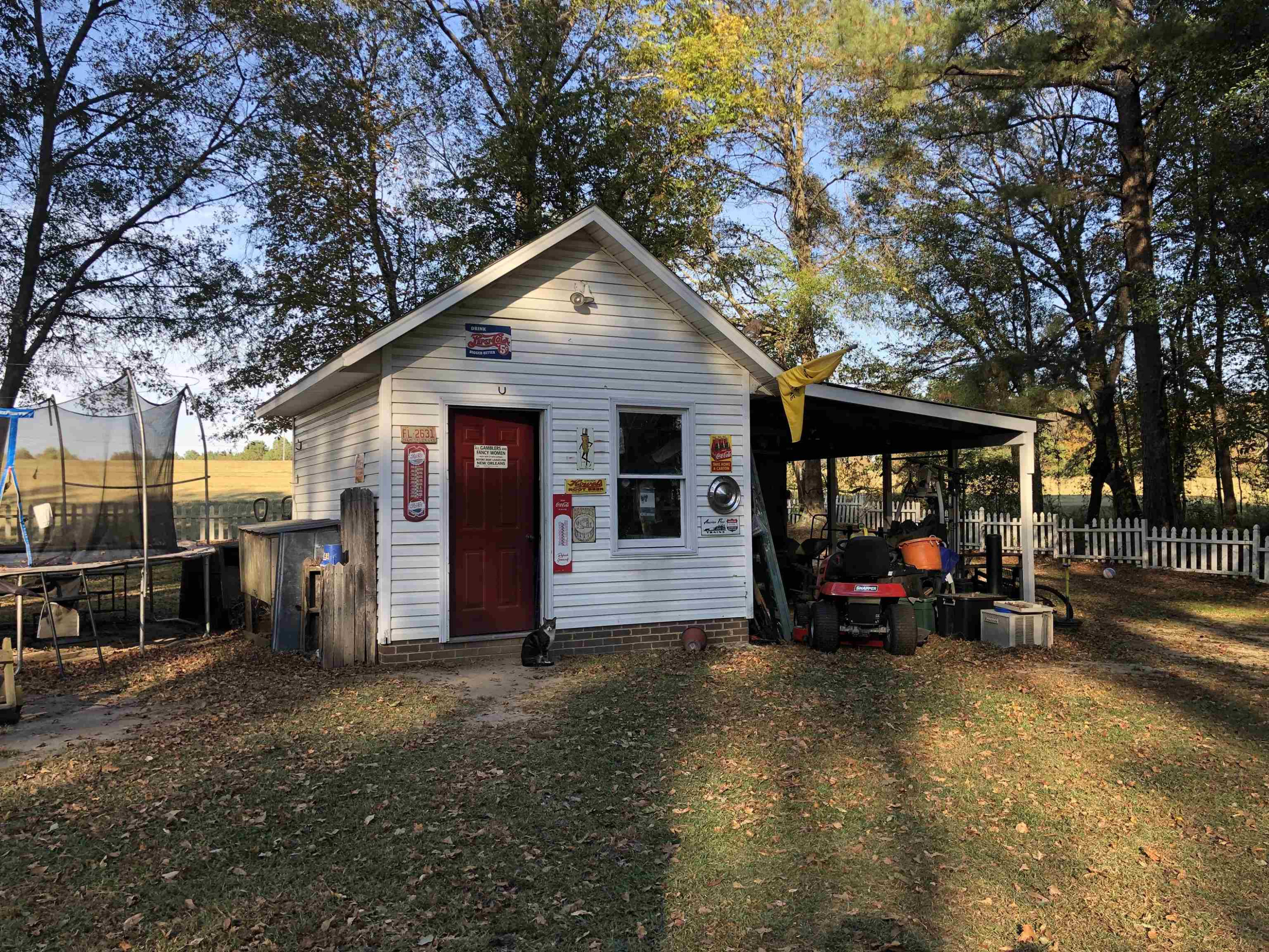 91 Violet Lane Coats, NC 27521 - Photo 4 of 19 a view of a car park in front of house