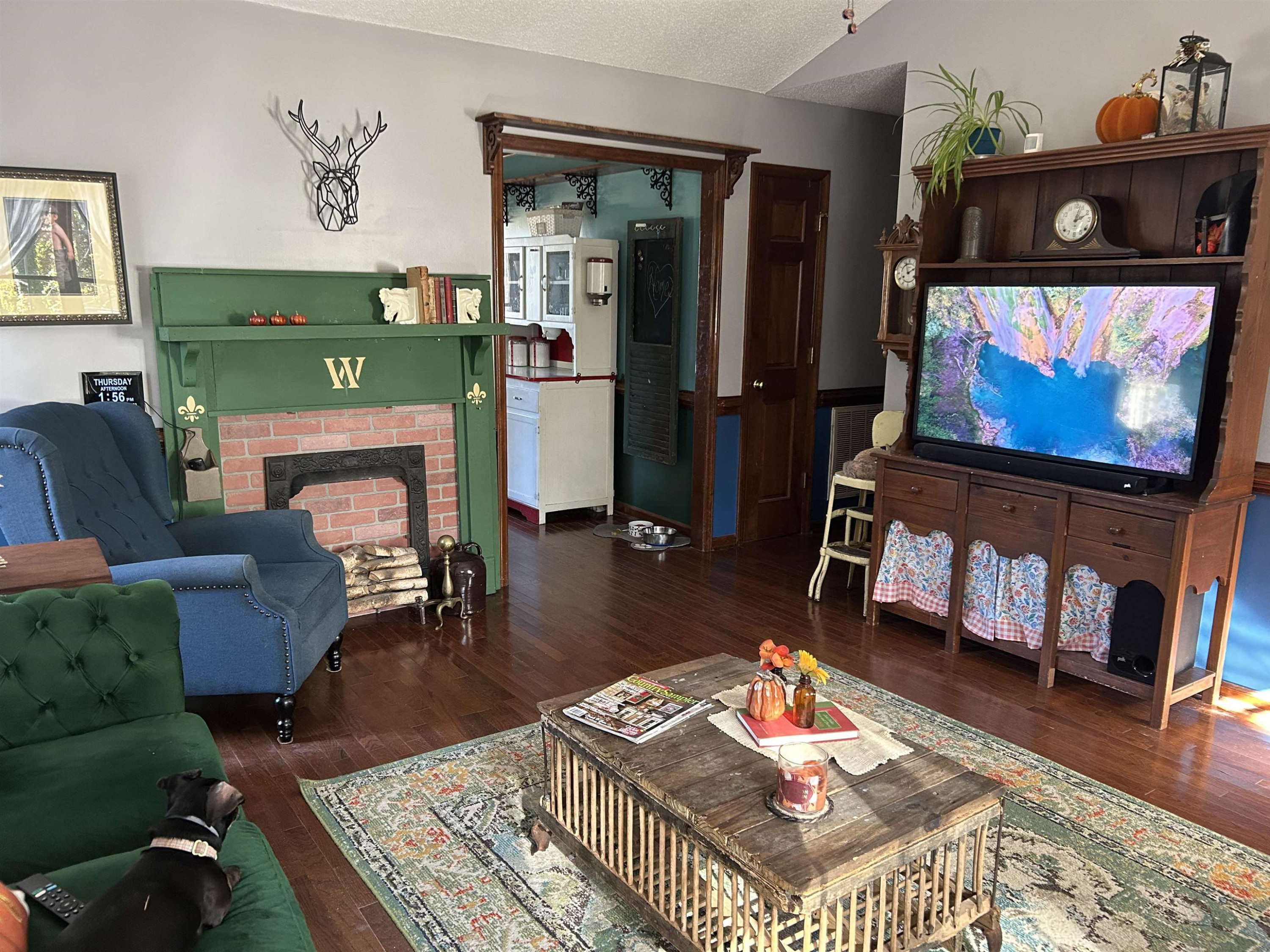 91 Violet Lane Coats, NC 27521 - Photo 9 of 19 a living room with furniture and a flat screen tv