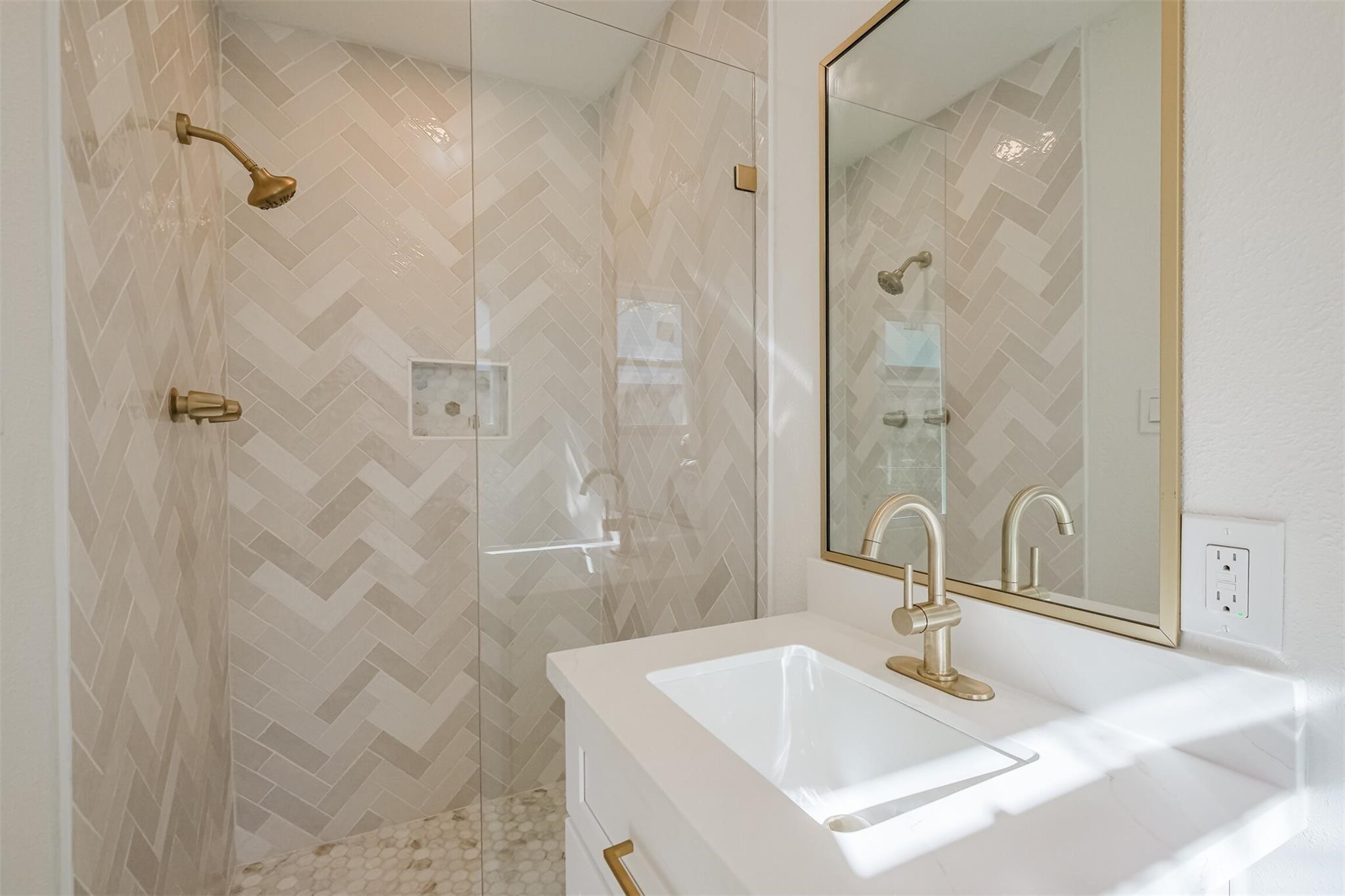 9419 Campbell Road Houston, TX 77080 - Photo 17 of 29 a bathroom with a sink and a mirror