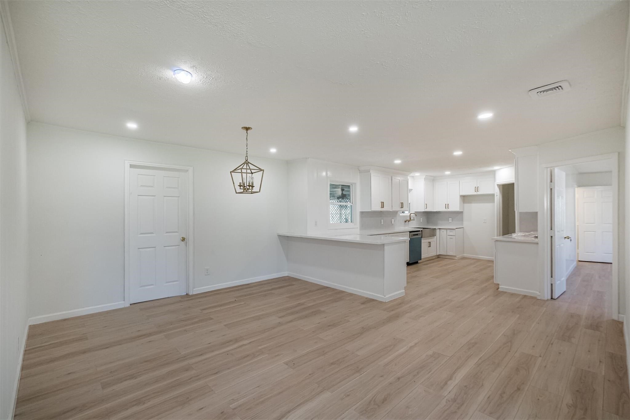 9419 Campbell Road Houston, TX 77080 - Photo 4 of 29 a view of kitchen and kitchen island