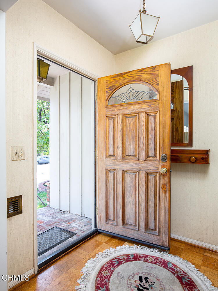3775 Hampton Road Pasadena, CA 91107 - Photo 4 of 28 a bedroom with a bed and a window