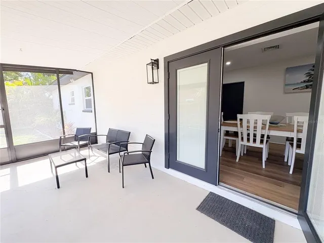 a living room with furniture and a table
